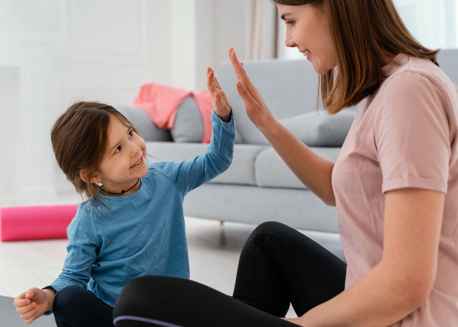 Therapist working warmly with a young child at Cadence Cure