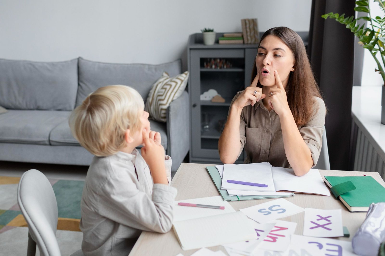 Speech therapist working one-on-one with a child
